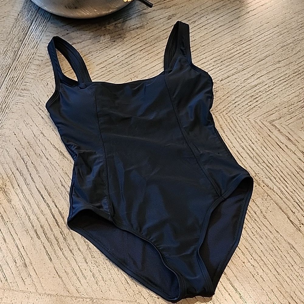 Black one piece swimsuit size S never worn only tried on brand new condition